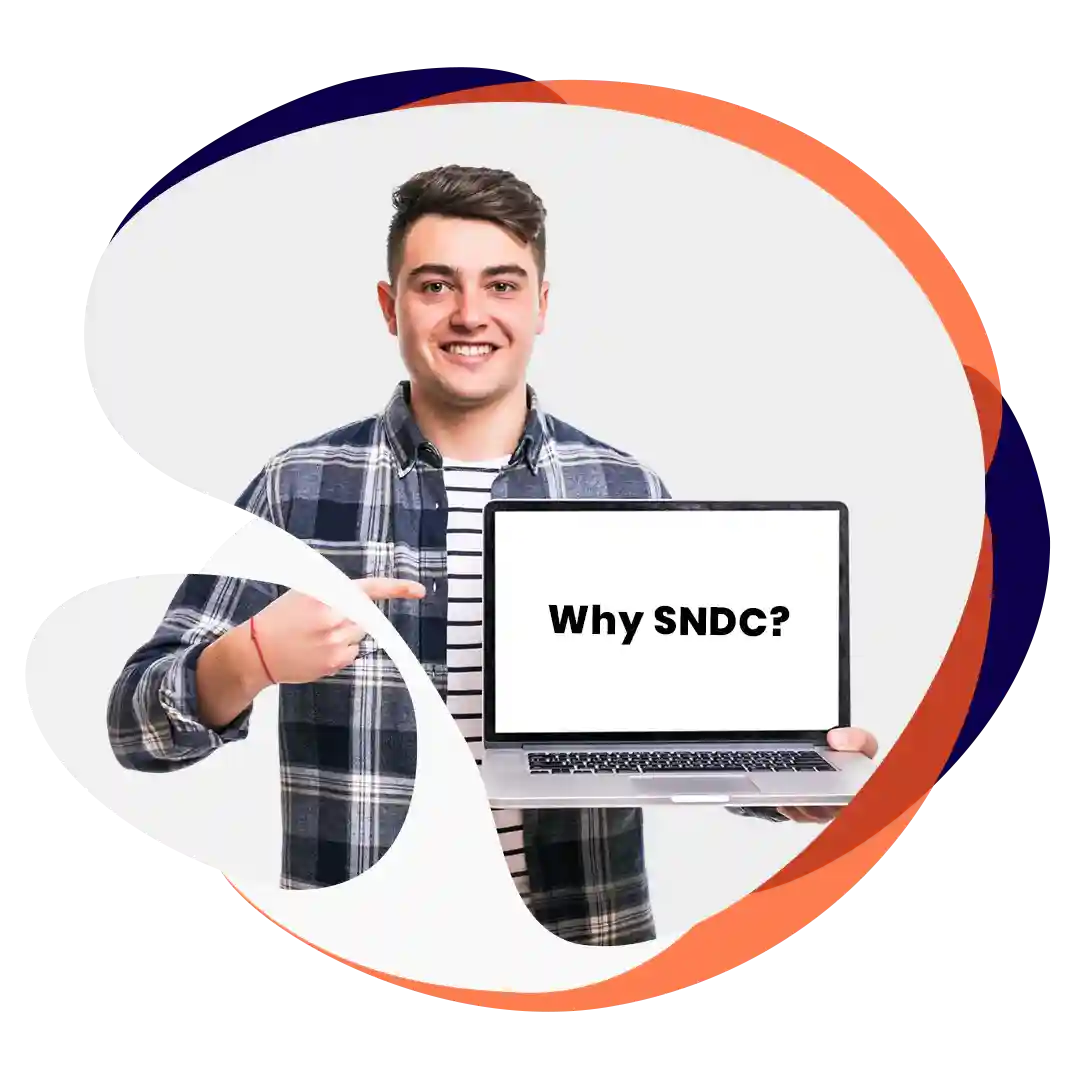 Person holding laptop displaying text “Why SNDC?” representing education and career opportunity